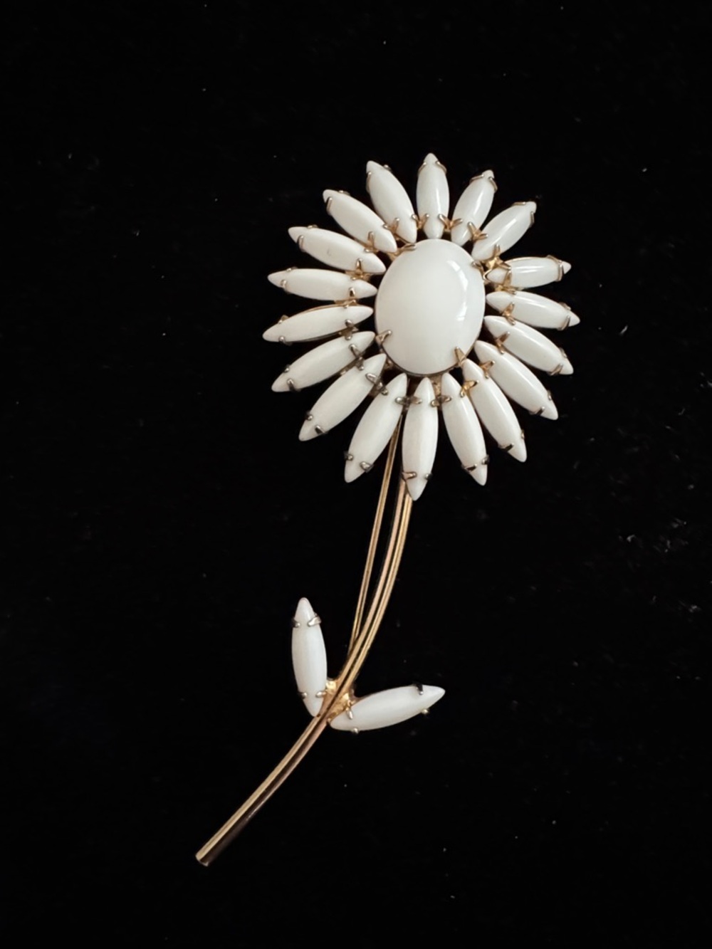 Vintage Napier white Milk glass floral brooch with gold tone metal.